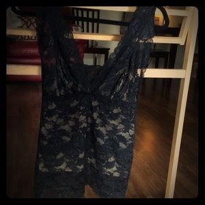 Black lace top with nude lining. Size 3.